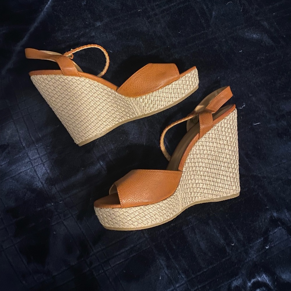 NEW. Light brown wedge heels.